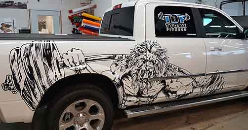 vinyl wrap full car wrap on ford truck by Landon graphics and Sign